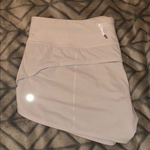Size ten white lululemon speed up shorts